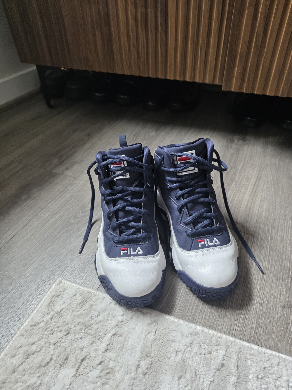Fila  Navy and White Mid-Top Sneakers with Red Logo
